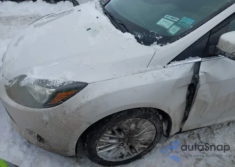 2014 Ford Focus Titanium из США, поврежденный, VIN 1FADP3J20EL193180